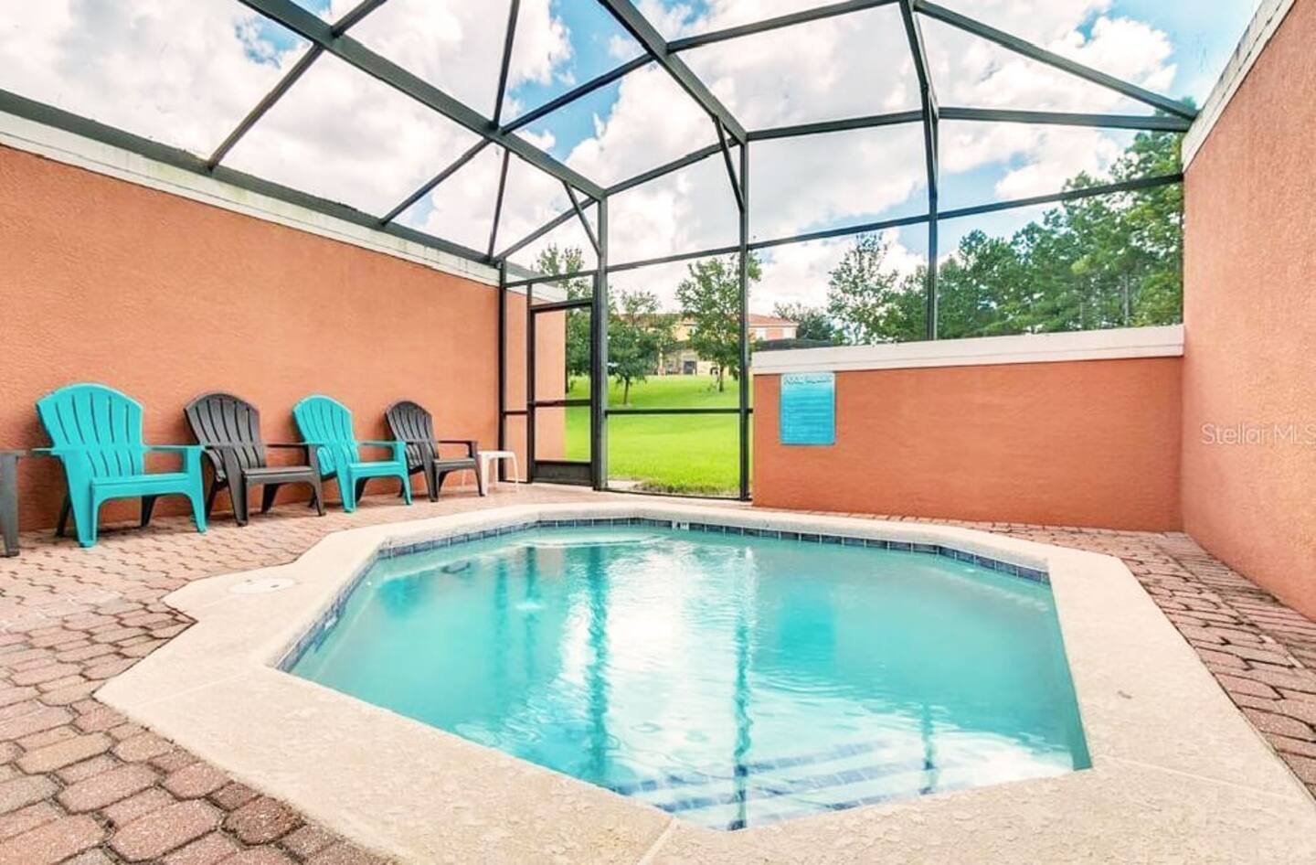 Take a dip in this private pool within the property.