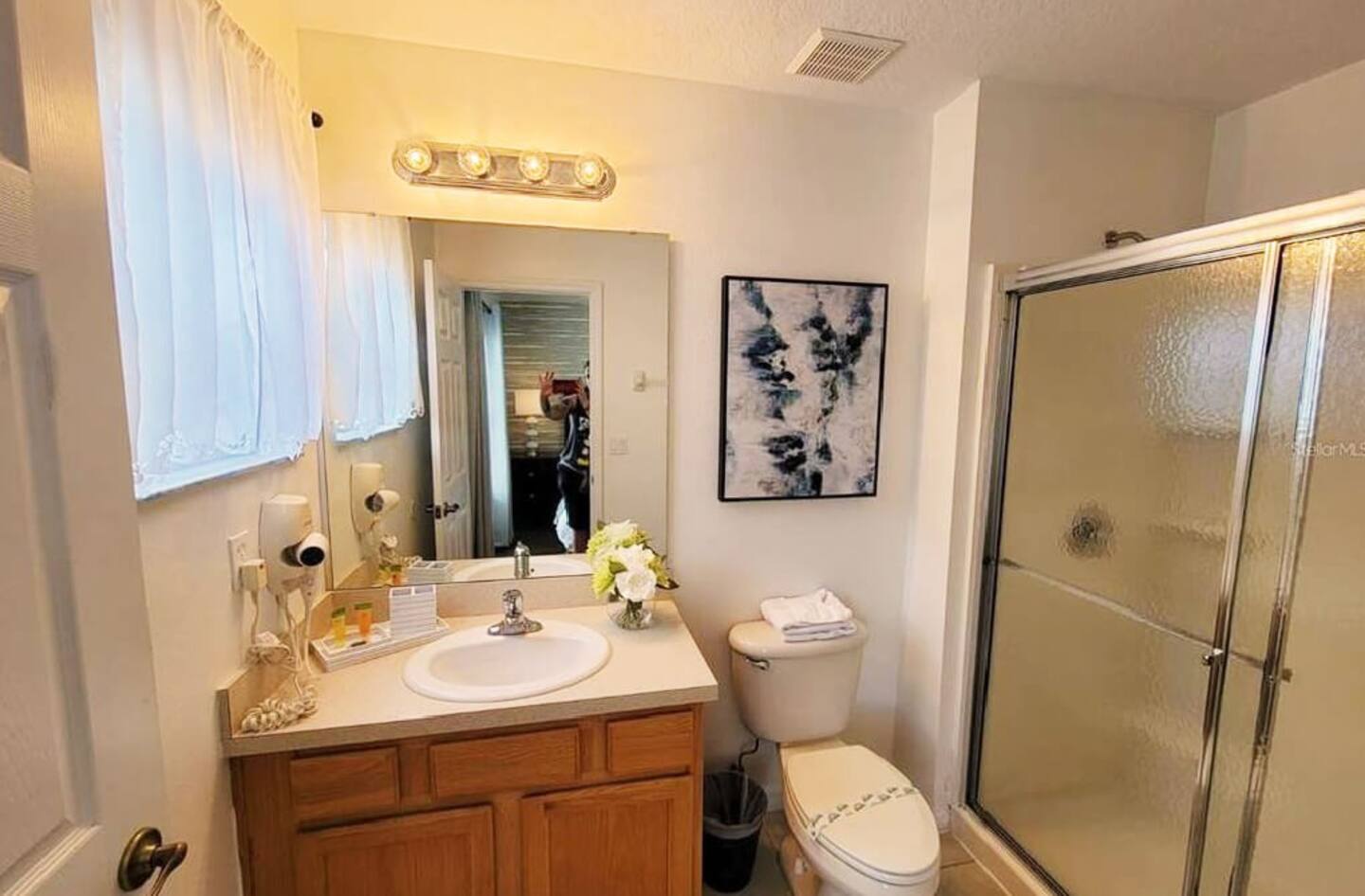 A bathroom equipped with a shower.