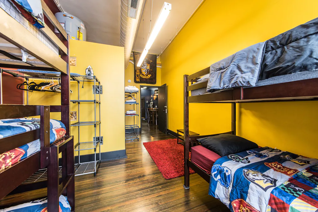 EACH House Room (named after the 4 Hogwarts Houses as you've probably noticed from the photos) has 5 twin beds, contained on two bunk-beds.