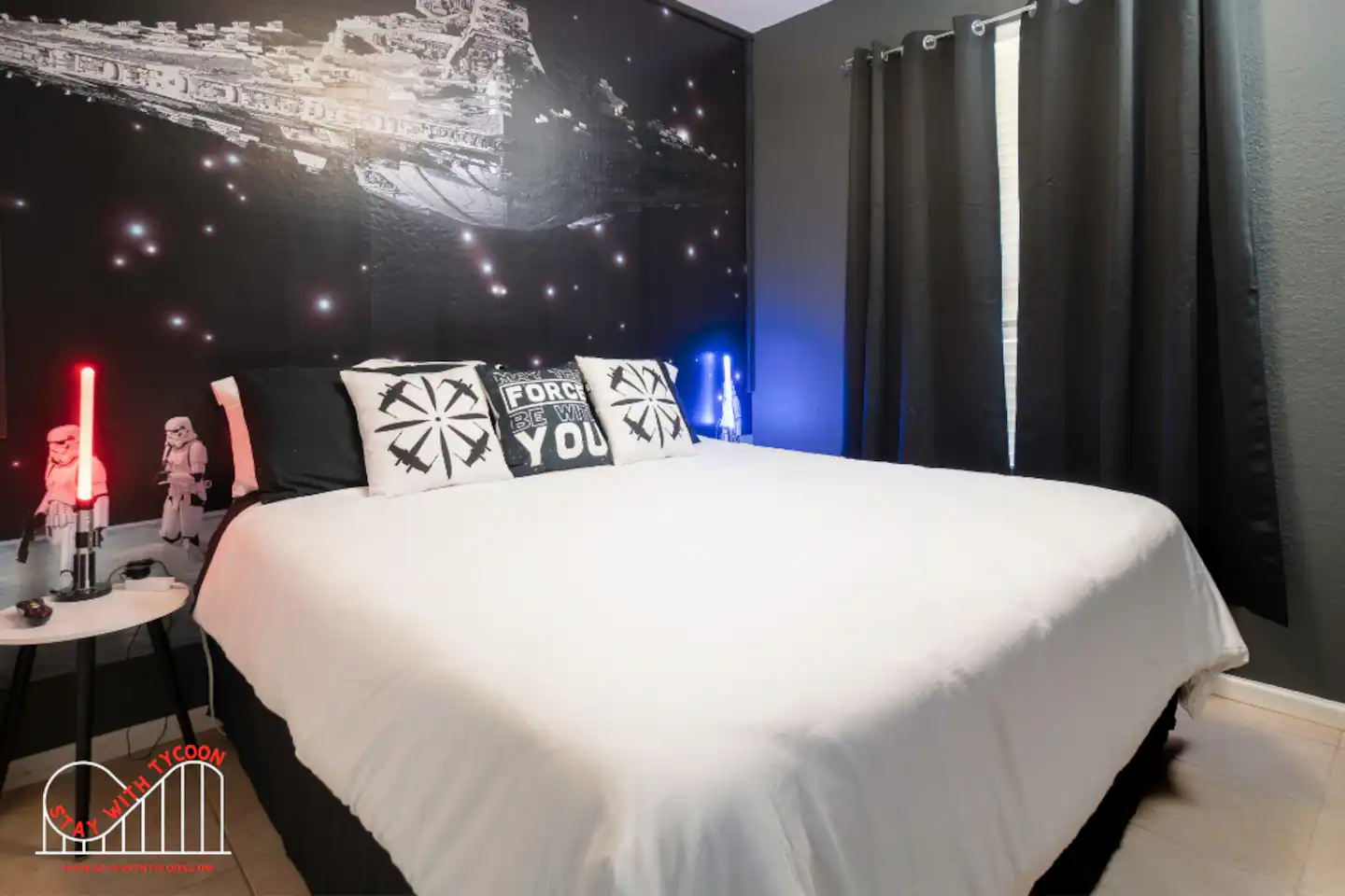 A king-sized bed in a Star Wars bedroom!
The Toy Story restroom is shared with the Harry Potter and Star Wars rooms!
Slides at the Community Pool
Living room with a Mickey Mouse motif!
Mickey Mouse Kitchen and Living Room in the Entryway!
Mickey Mouse Kitchen is fully stocked.