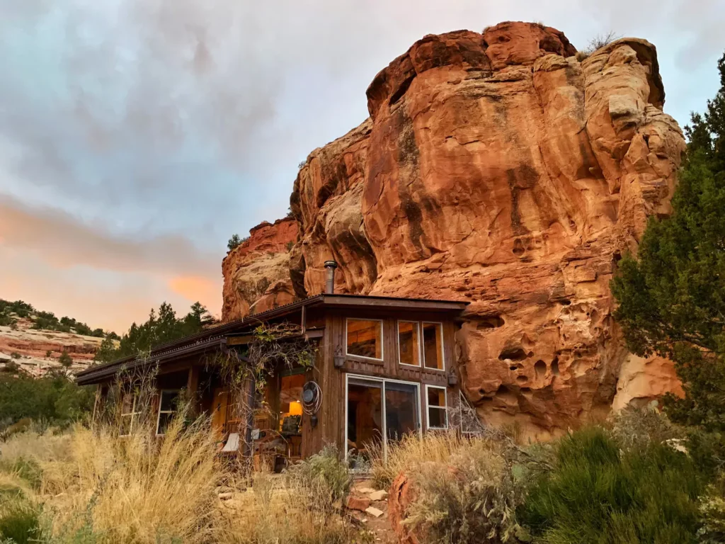 The Cliff House built into the red rock wall in a private alcove.
