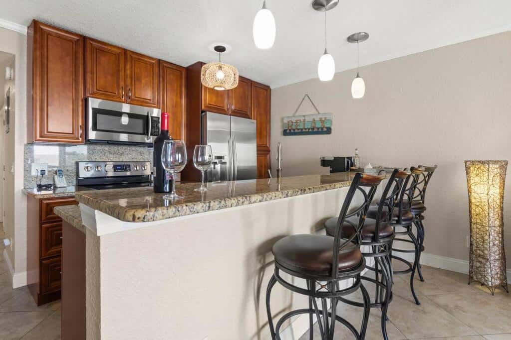 An equipped kitchen with a dishwasher and an oven.