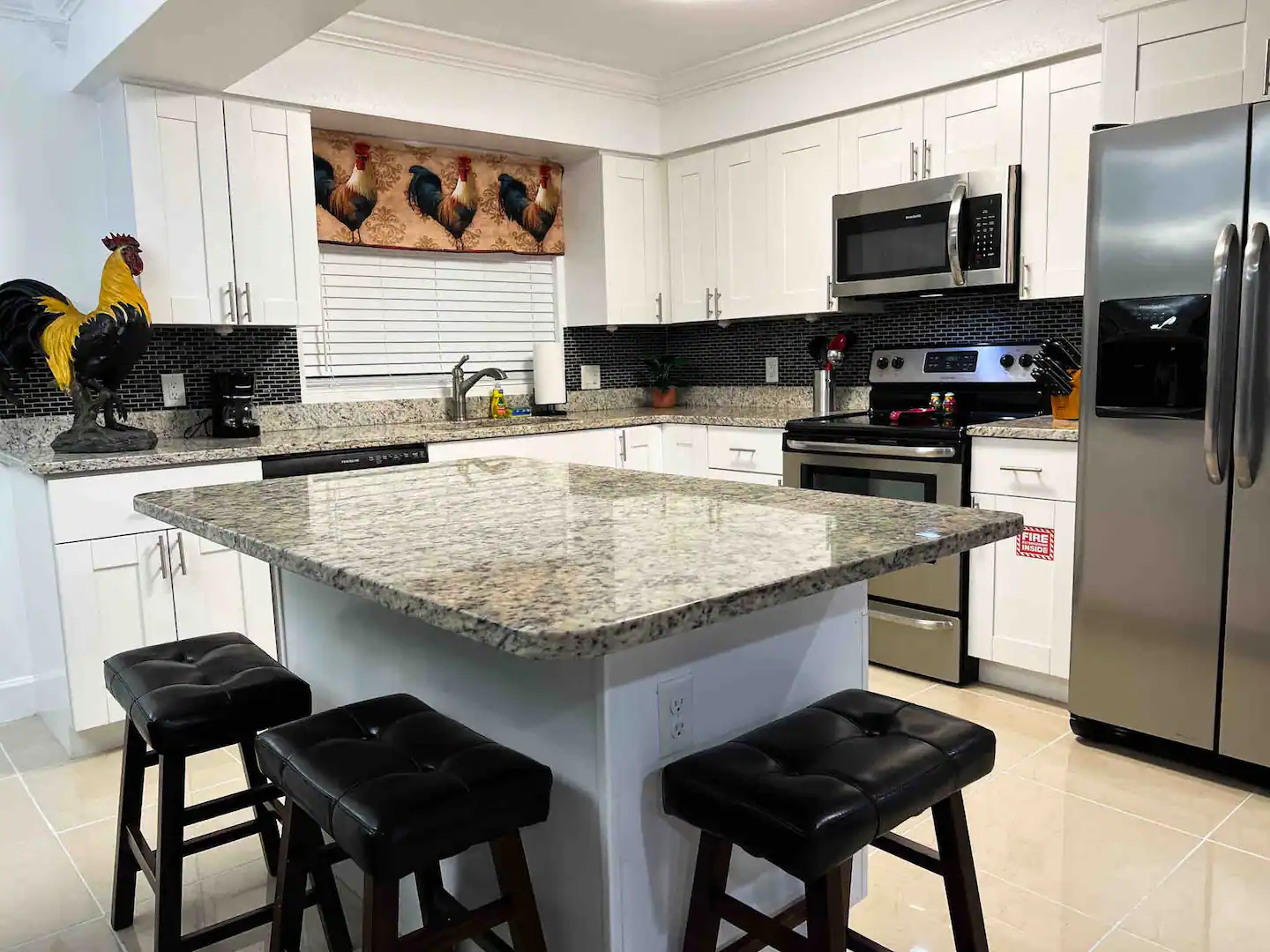 Large kitchen with all updated appliances and gathering island.