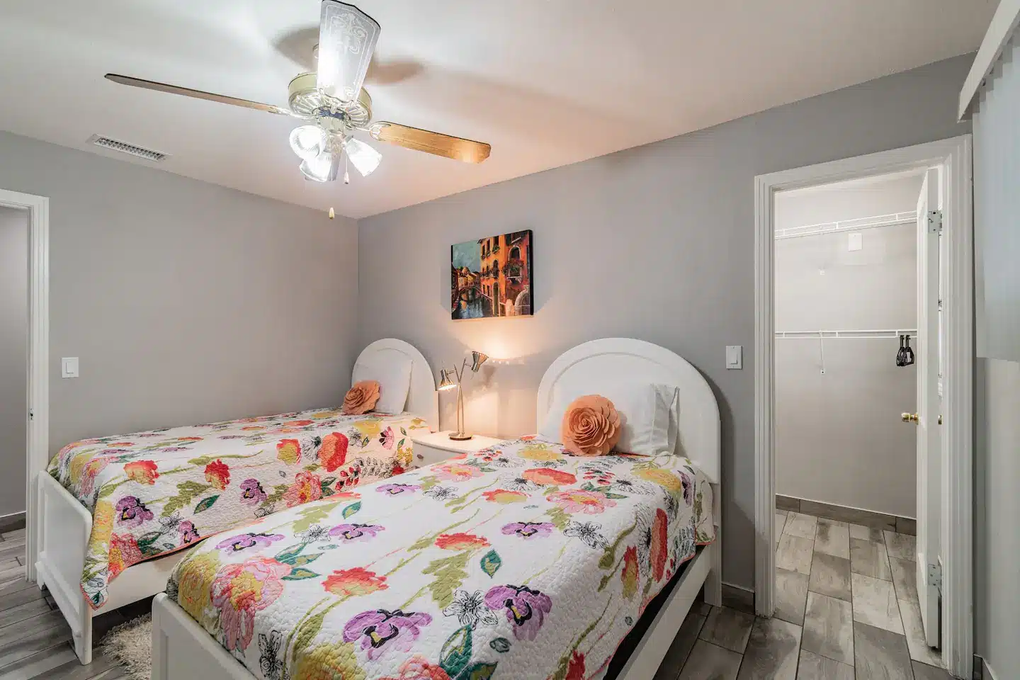 Two twin size beds with walk in closet