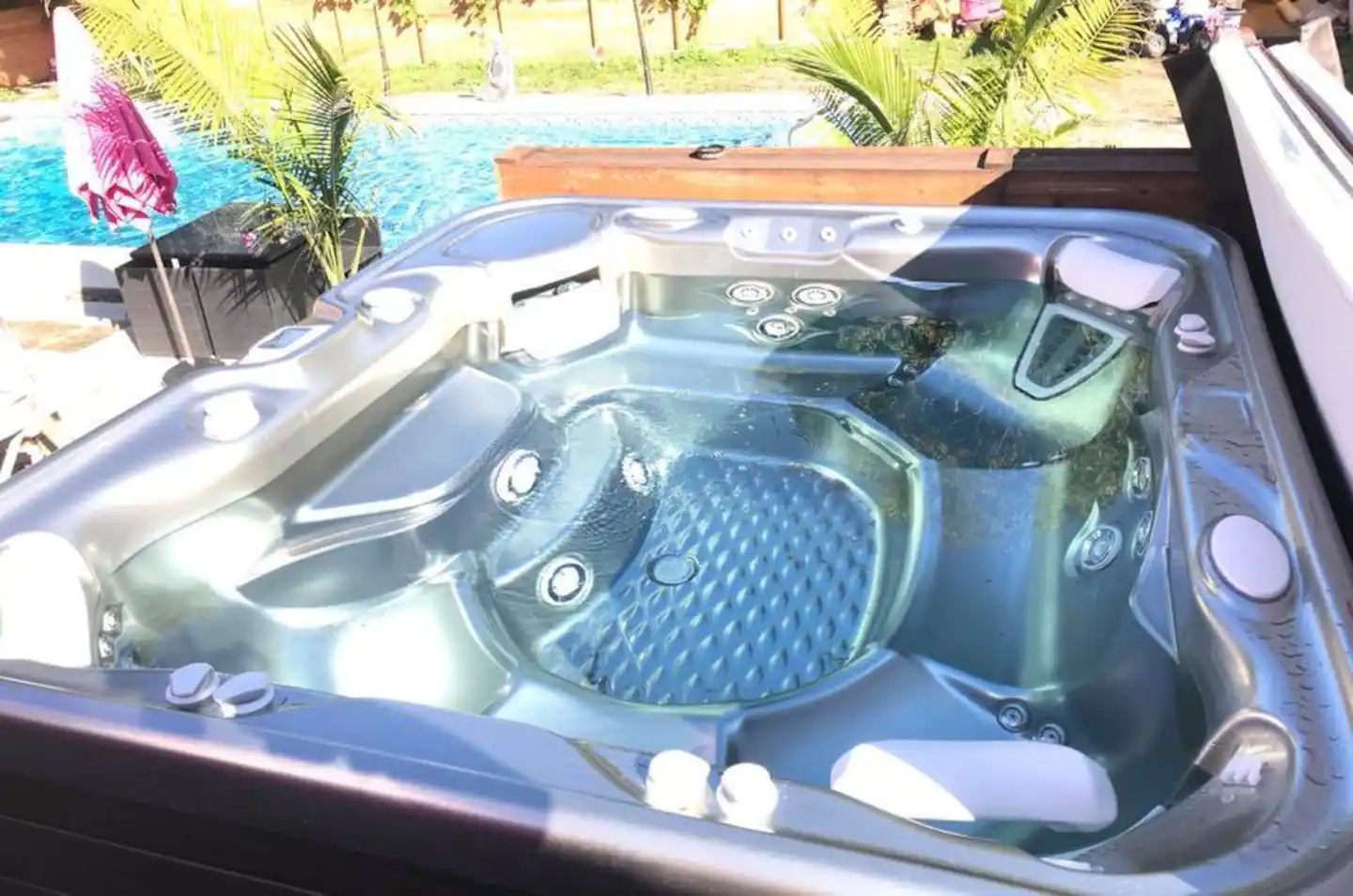 The Hot tub “seats 6” but will hold more.
