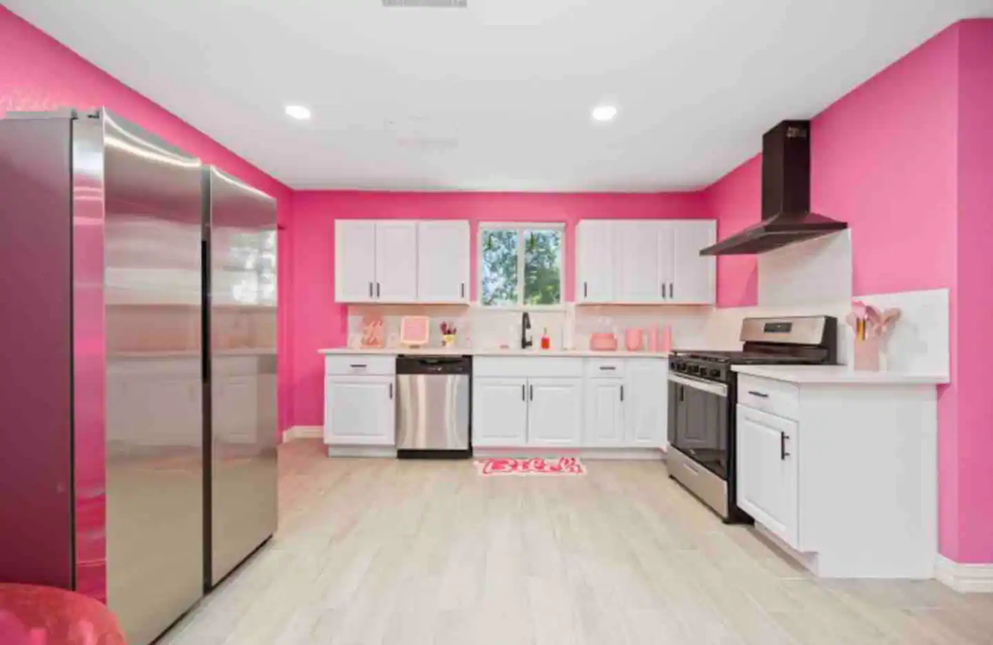 Quartz countertops, Pink Tea Kettle, Gas Oven, Air Fryer, Pink Kitchen Utensils, Pink Plates, Pink Cups, Pink Bowls, iridescent eating Utensils, Pink Pots & Pans.