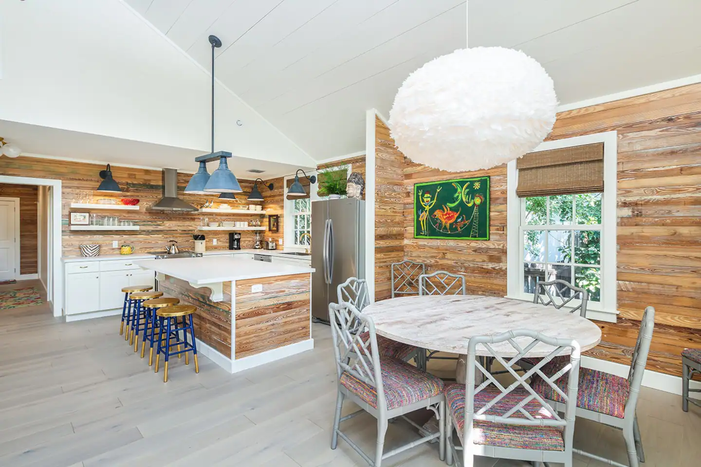 View of the dining room and kitchen.